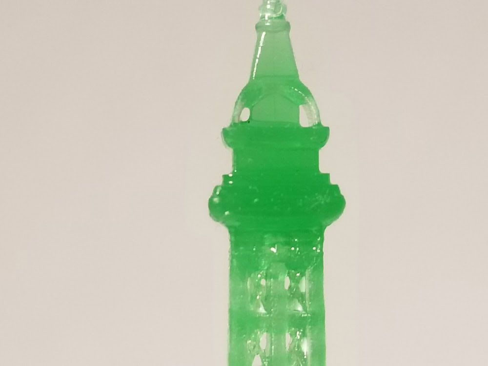 Photo of Eiffel Tower 3D printout with closeup of the top.