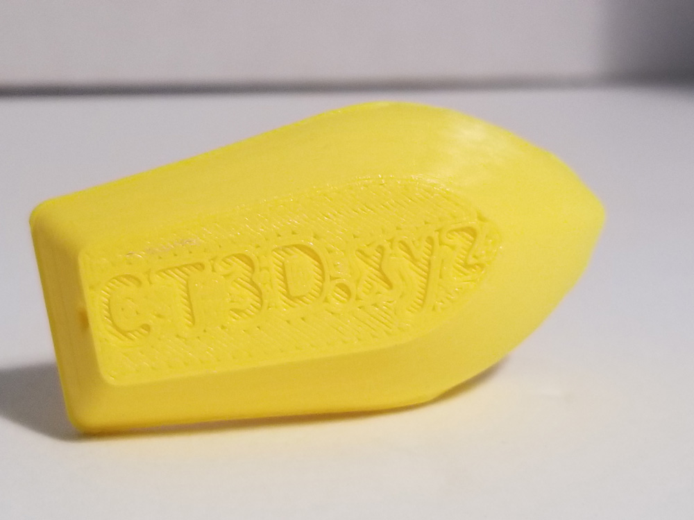 Photo: Yellow benchi tugboat with printer issues fixed. View of bottom with lettering.