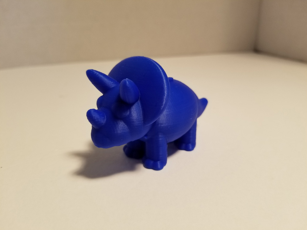 Photo: 3D printout of a blue triceratops.