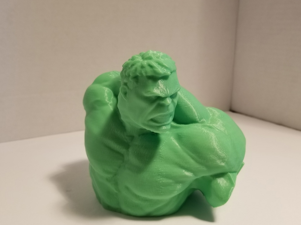Photo of green 3D printout of the Incredible Hulk's head and upper body - front.