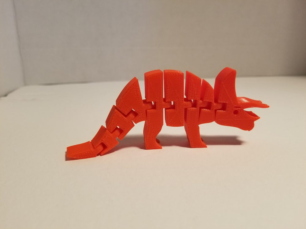 red triceratops - side view.